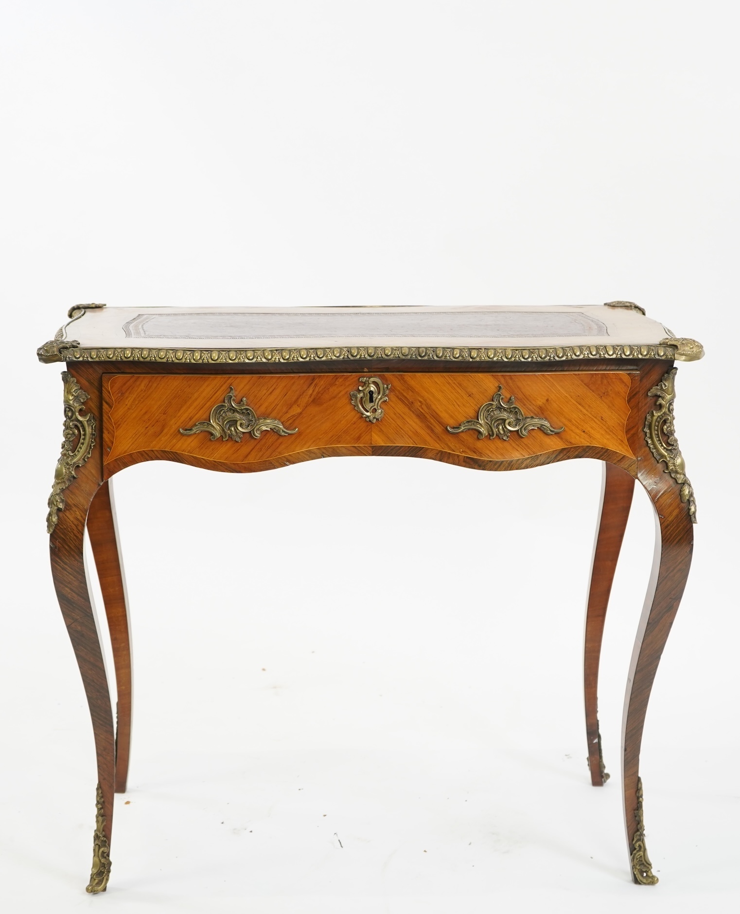 A small Louis XV style gilt metal mounted rosewood and kingwood bureau plat